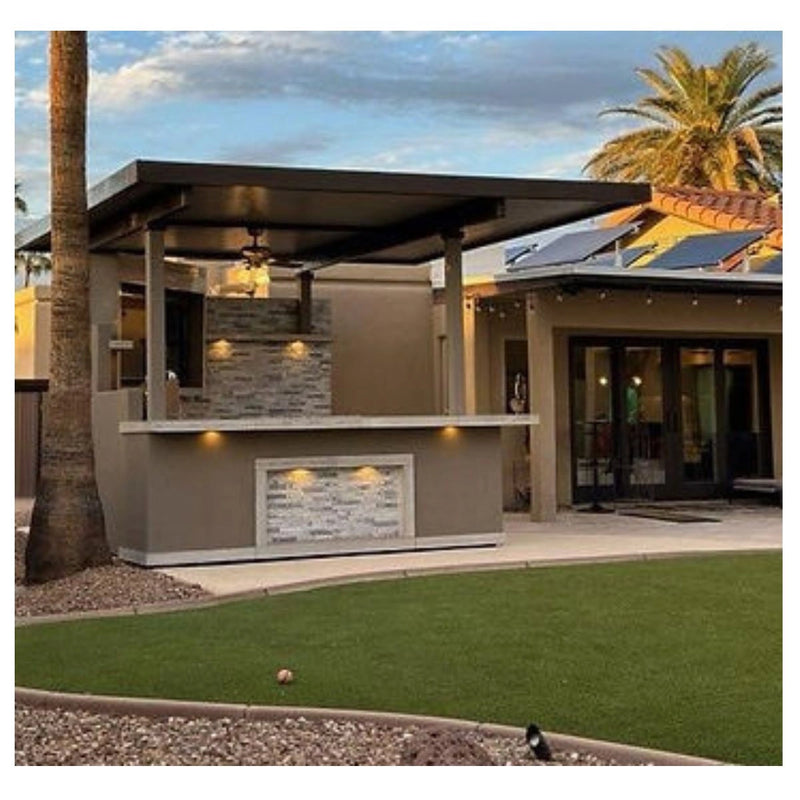 Kokomo Grills Best Outdoor Kitchen Bermuda BBQ Island with pergola, stone accents, built-in lighting, and spacious countertop.