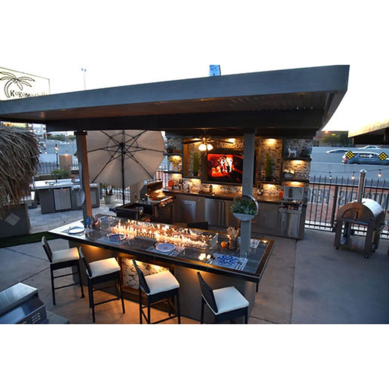 Kokomo Grills Outdoor Kitchen Montego Model BBQ Island with built-in grill, stainless steel drawers, and sleek modern design under pavilion