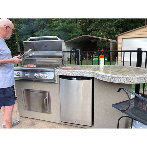 Kokomo Grills Maui 7'6" BBQ Island with 33" round bar, 4-burner grill, stainless steel fridge, porcelain tile countertop, and LED lights