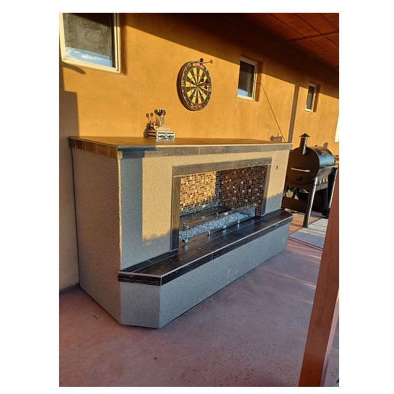 Kokomo Grills Entertainer Fireplace with stucco finish, tile face, mosaic backsplash, and clear fire-glass burner insert.