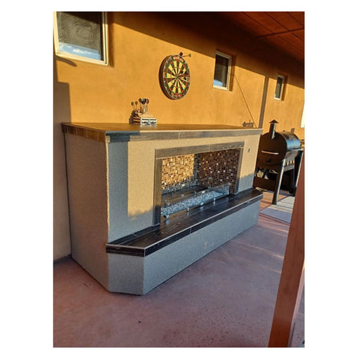 Kokomo Grills Entertainer Fireplace with stucco finish, tile face, mosaic backsplash, and clear fire-glass burner insert.