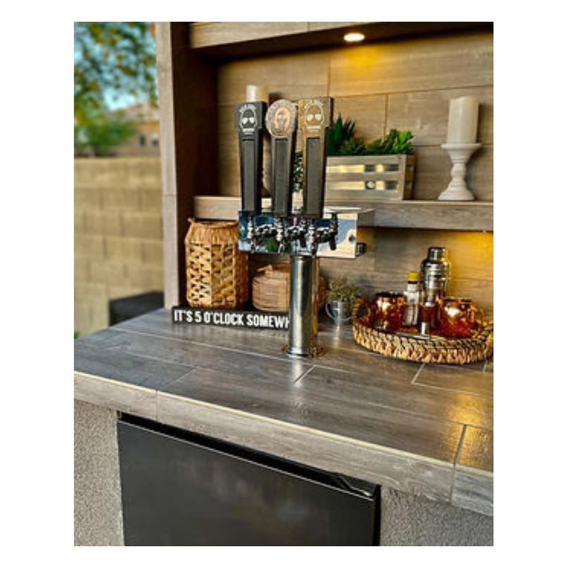 Kokomo Grills Fantasy Island 20'x20' with outdoor kegerator taps, gray tiled countertop, shelving, and ambient lighting.