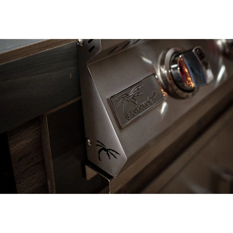 Kokomo Grills Elite 6' BBQ Island with driftwood composite siding and stainless steel 4-burner grill control panel close-up.