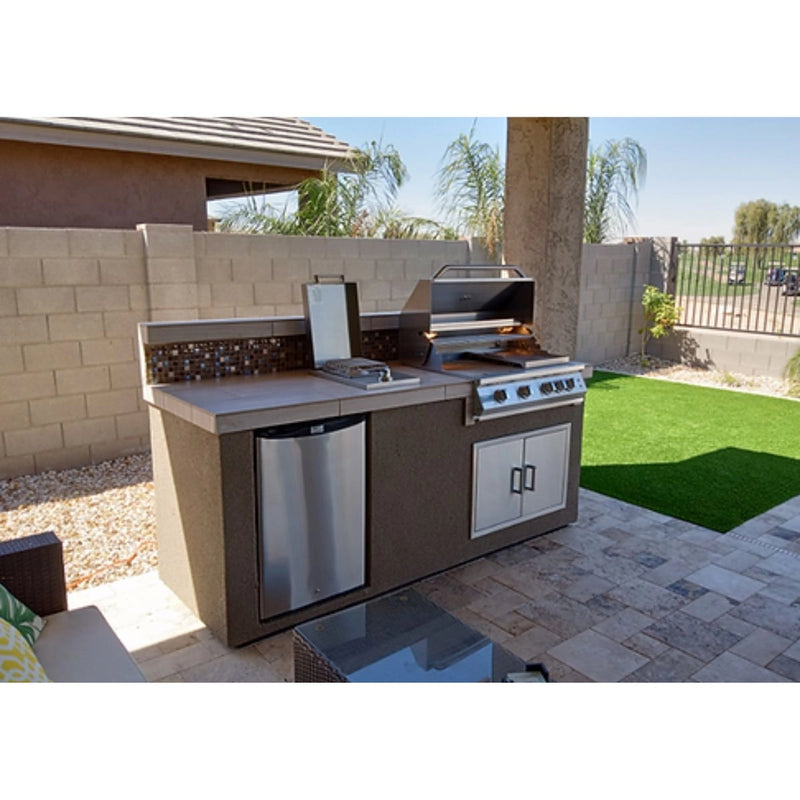 Kokomo Grills Bali 7'6" Island with Backsplash and Built In BBQ Grill in Spectrum Brown stucco with stainless steel fridge and 4-burner grill.
