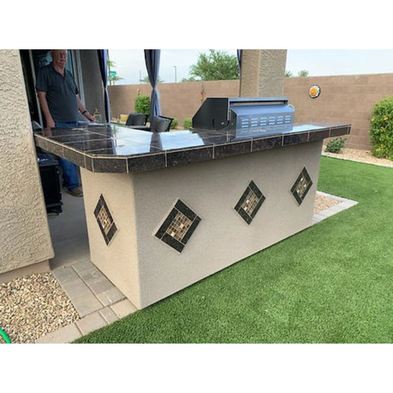 Kokomo Grills St. John 7'6" BBQ Island with Spectrum Brown stucco, tile countertop, high bar on three sides, and built-in 4 burner grill.