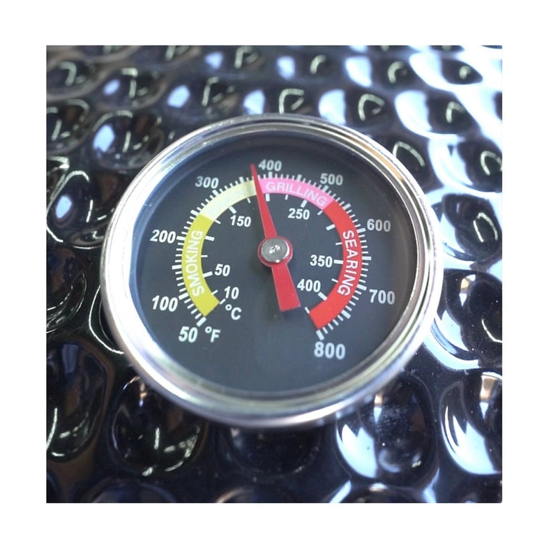 Temperature gauge on the black Kokomo Grills 21 Inch Kamado KoKoMo Ceramic BBQ Grill showing smoking, grilling, and searing ranges.