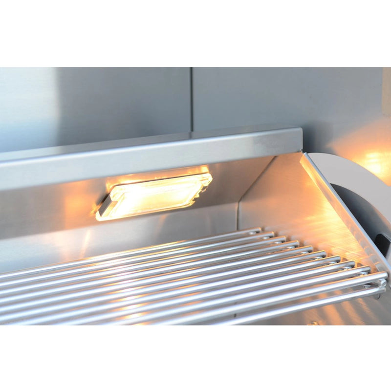 Kokomo Grills 32” Professional Built in Gas Grill with stainless steel warming rack and interior oven light glowing inside the grill.