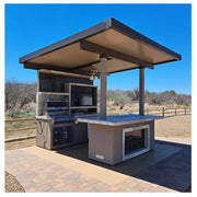 Kokomo Grills Baja W/ Top outdoor kitchen with dual BBQ islands, built-in grill, TV, refrigerator, gas fire, and aluminum patio cover.