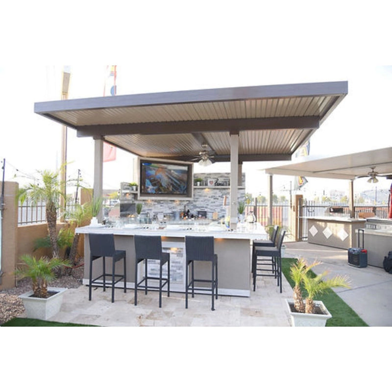 Kokomo Grills Best Outdoor Kitchen Bermuda BBQ Island with pergola, oversized TV, bar seating, and stone countertop.