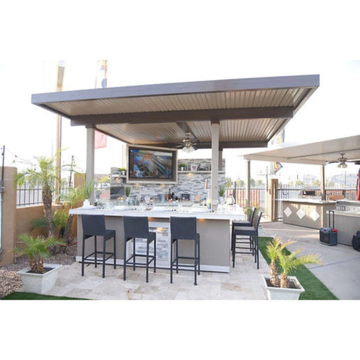 Kokomo Grills Best Outdoor Kitchen Bermuda BBQ Island with pergola, oversized TV, bar seating, and stone countertop.