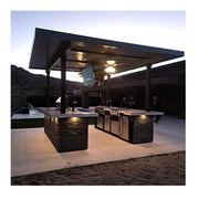 Kokomo Grills Big Island Sports Bar Outdoor Kitchen Grill with dual TVs, stainless steel doors, and stone facade under covered pavilion.