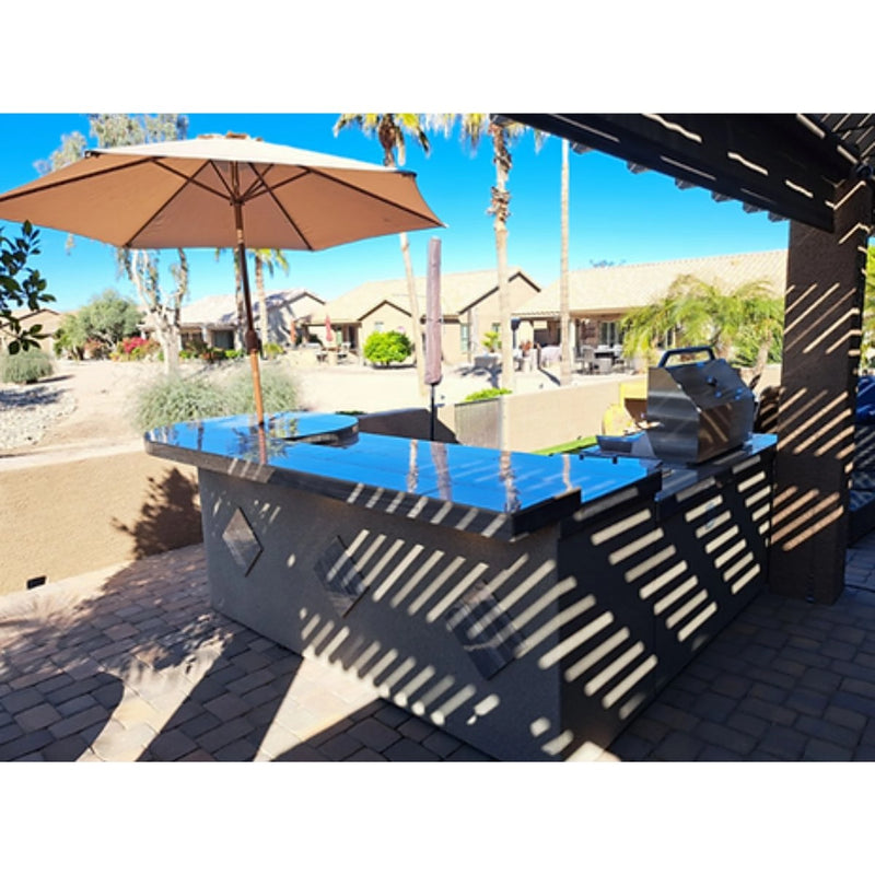 Kokomo Grills Aruba BBQ Island 6'x9'6" L-shape with tile countertop, Spectrum Brown stucco, built-in grill, side burner, and refrigerator.