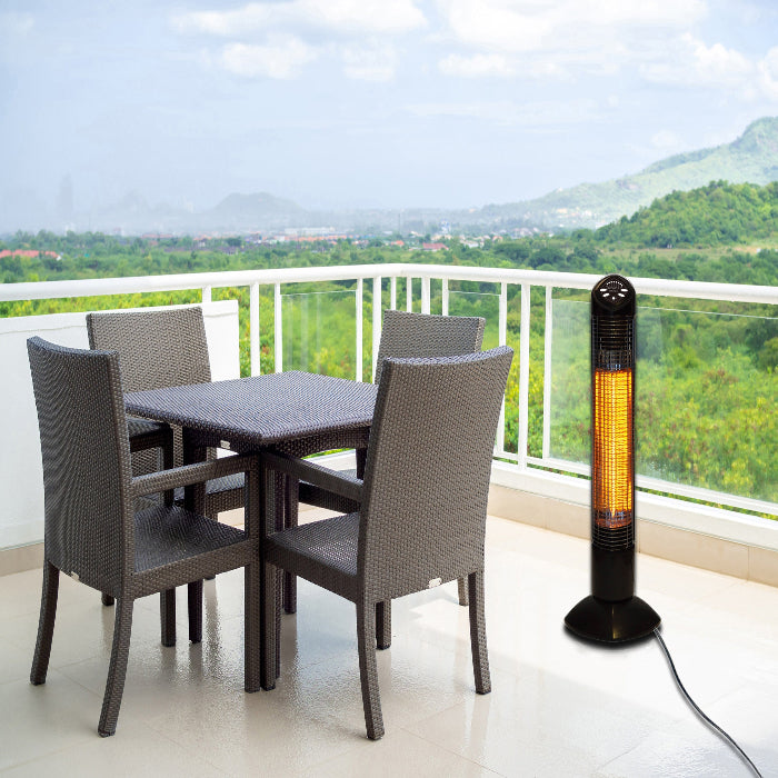 Outdoor patio set with table and chairs on a balcony, featuring a patio heater.