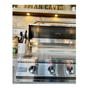 Kokomo Grills Fantasy Island 20'x20' featuring a 5 burner 40" stainless steel grill with illuminated control knobs and a sleek design.