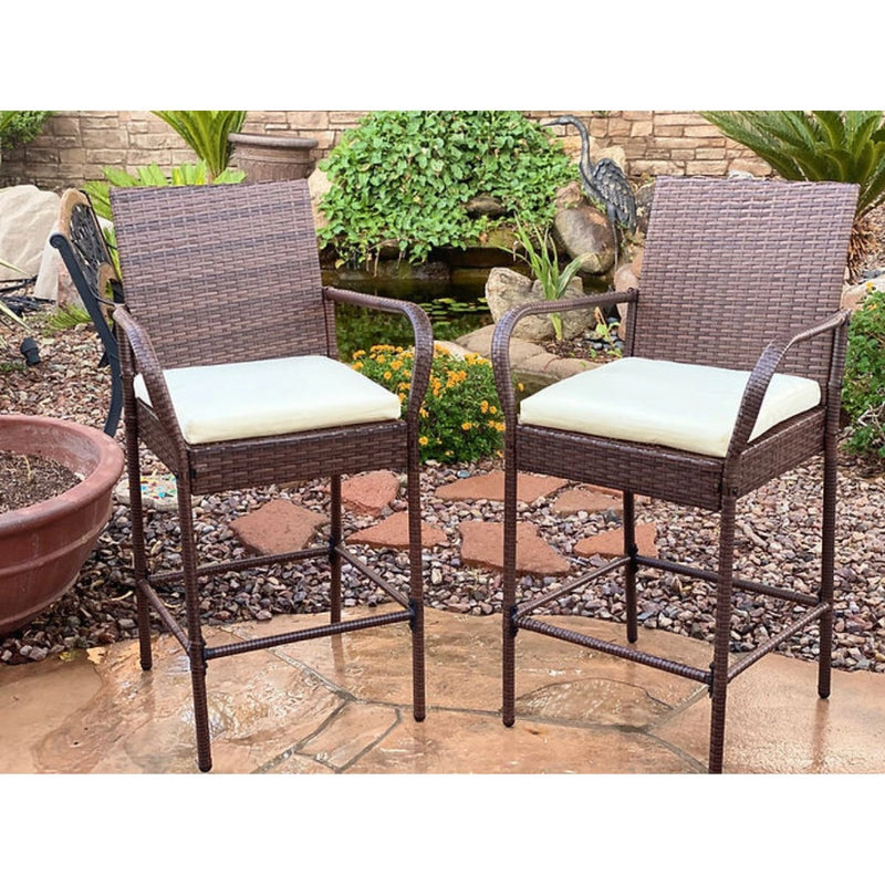 Kokomo Grills Rattan Outdoor Bar Stools 2 Pack with armrest, footrest, 30” seat height, and cream cushions in brown wicker