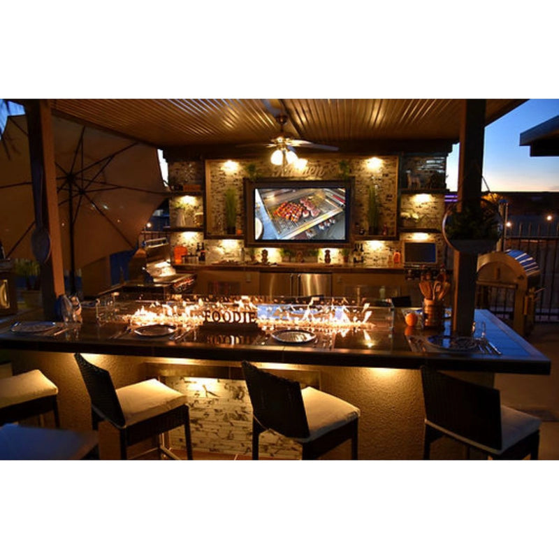 Kokomo Grills Outdoor Kitchen Montego Model BBQ Island with built-in grill, storage drawers, and weather-resistant galvanized steel frame.