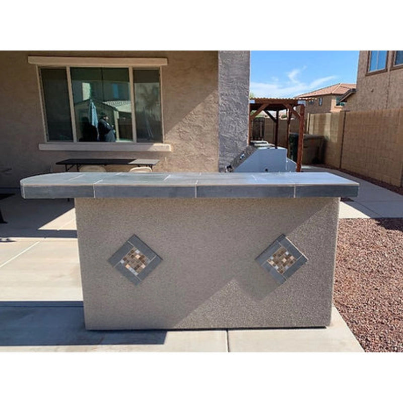 Kokomo Grills Aspen BBQ Island with 4 Burner Built In BBQ Grill in Spectrum Brown stucco with tile countertop and double-sided bar overhang.
