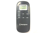 Black Westinghouse remote control with digital display on a white background