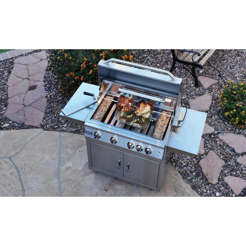 Kokomo Grills Professional 4 Burner 32 Inch Cart Model BBQ Grill with stainless steel body, illuminated knobs, side shelves, and locking casters.