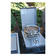 Kokomo Grills Single Side Burner KO-BAK1BG stainless steel built-in burner with polished handle and brass ring burner heating a pan outdoors.