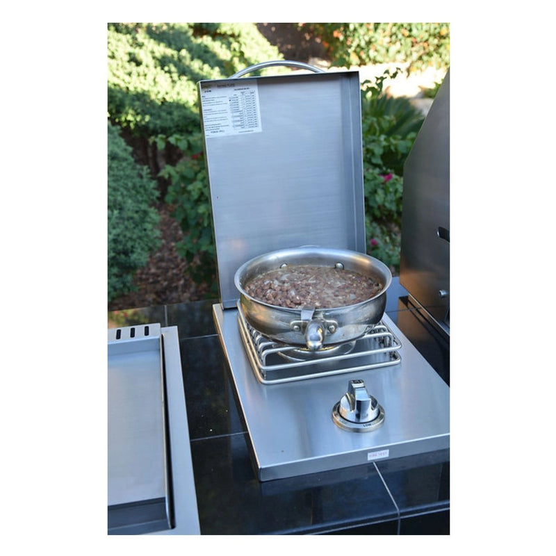 Kokomo Grills Single Side Burner KO-BAK1BG stainless steel built-in burner with polished handle and brass ring burner heating a pan outdoors.
