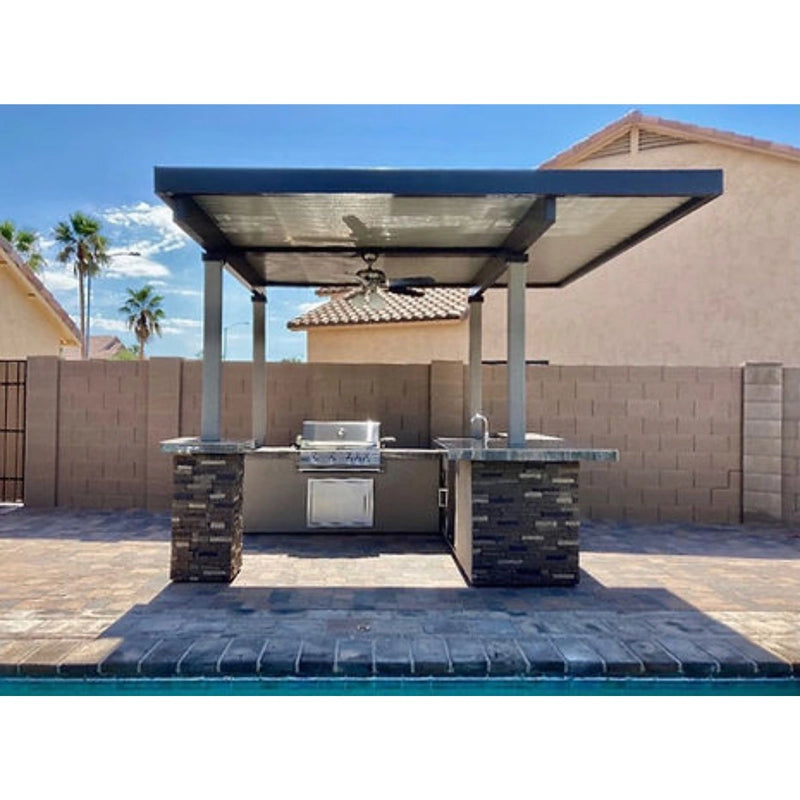 Kokomo Grills Aruba BBQ Island with 12' x 12' pergola, 4 burner grill, stone accents, tile countertop, and fan with lights.