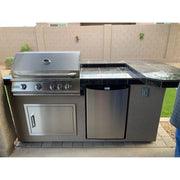 Kokomo Grills St. John 7'6" BBQ Island with 4 burner stainless steel grill, outdoor fridge, tile countertop, and Spectrum Brown stucco finish.