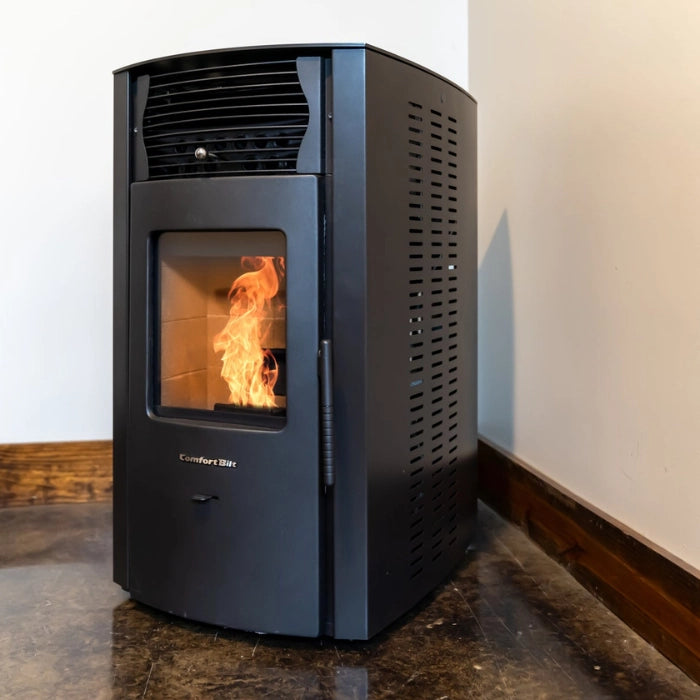 Black pellet stove with visible flames inside, mounted on a wall.