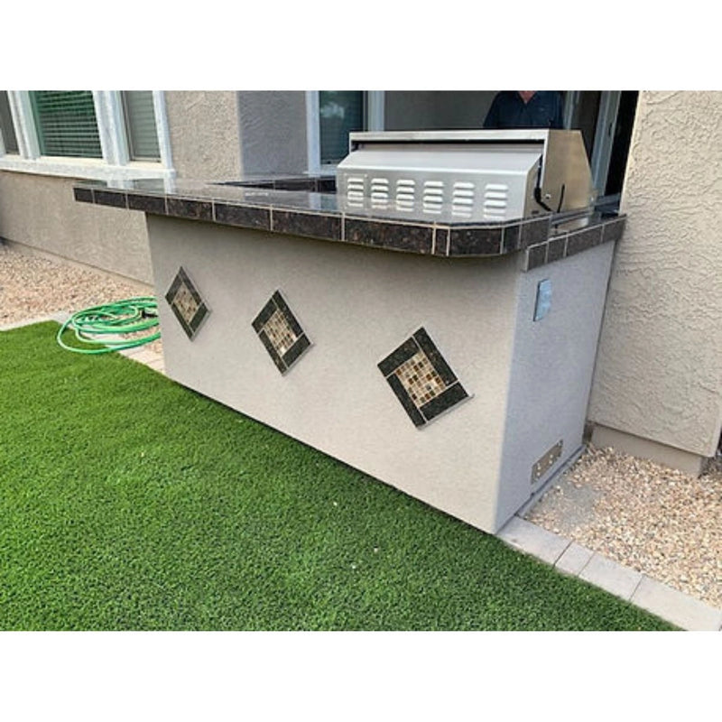 Kokomo Grills St. John 7'6" BBQ Island with Spectrum Brown stucco, tile countertop, 4-burner grill, and built-in lighting.