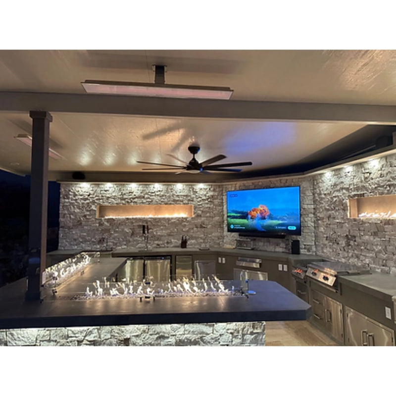 Kokomo Grills Luxury Outdoor Kitchen BBQ Grill Island with stone countertops, built-in TV, stainless steel appliances, and modern lighting.
