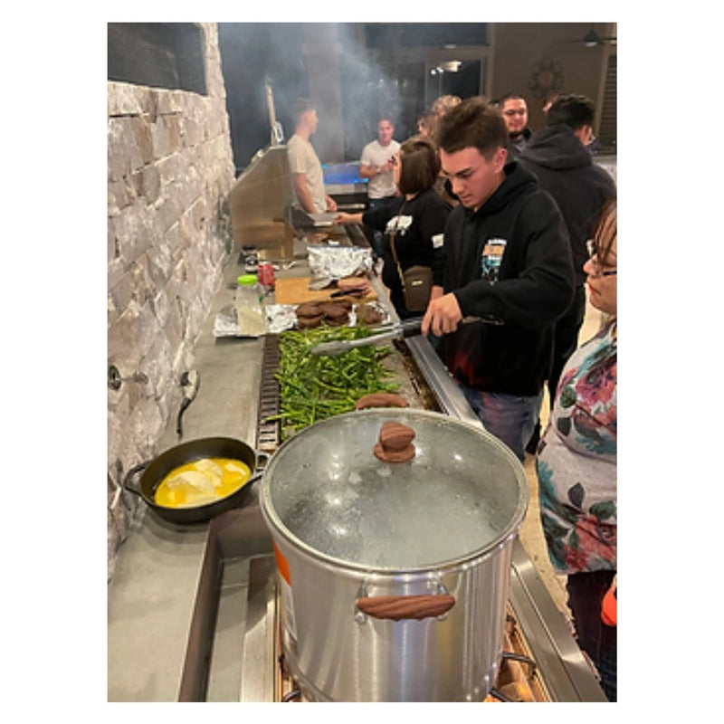 Kokomo Grills Luxury Outdoor Kitchen BBQ Grill Island with stainless steel burners, integrated grill, and spacious countertop setup.