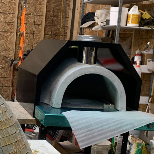 HPC Fire Inspired Di Napoli Series built-in pizza oven with refractory cement, stainless steel chimney, and arched front design.