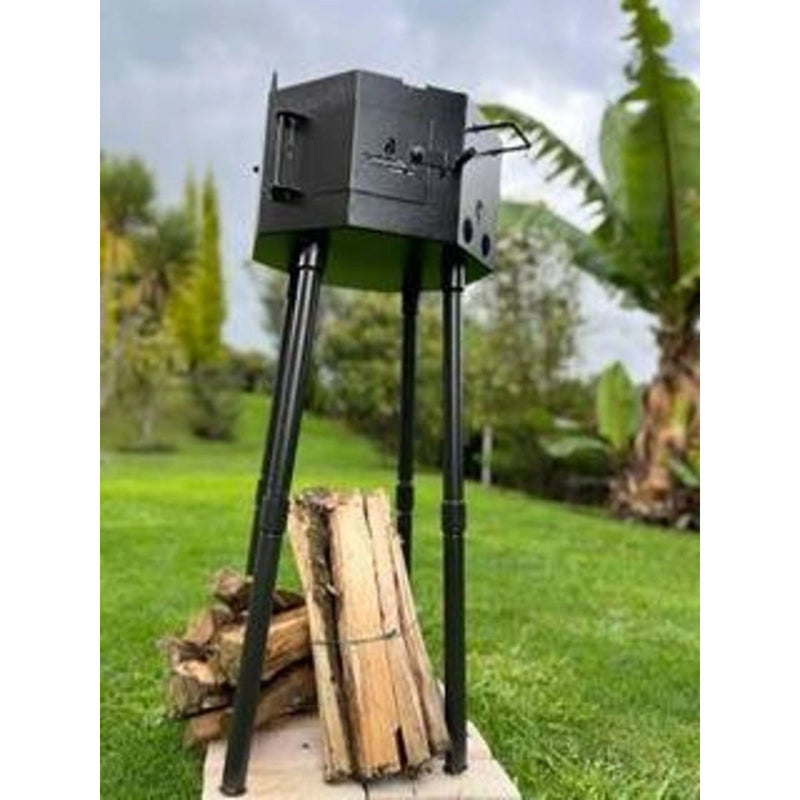 Grill Brothers Grill Travel portable charcoal grill with folding legs, compact black stainless steel design, ideal for outdoor cooking.