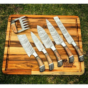 Grill Brothers SET KNIVES professional high-carbon steel BBQ knife set with ergonomic wooden handles on wooden cutting board.