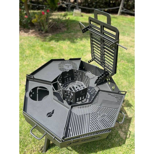 Grill Brothers Small Duomo premium Argentine grill with 3mm iron, octagonal shape, adjustable stake system, and multiple cooking surfaces.