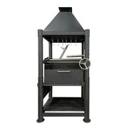 Tagwood BBQ The Beast Argentine Santa Maria grill in black painted steel with height-adjustable grates and peaked roof design.
