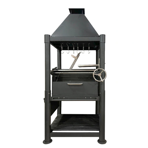 Tagwood BBQ The Beast Argentine Santa Maria grill in black painted steel with height-adjustable grates and peaked roof design.