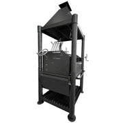 Tagwood BBQ The Beast Argentine Santa Maria Style wood fire grill with black painted steel, peaked roof, and adjustable grates.