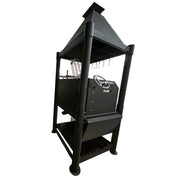 Tagwood BBQ The Beast Argentine Santa Maria Style black steel wood fire grill with peaked roof, adjustable grates, and brasero firebox.