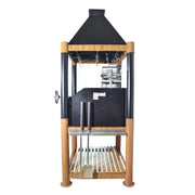 Tagwood BBQ The Beast Argentine Santa Maria Style grill with black painted steel, wood accents, height-adjustable grates, and brasero firebox.