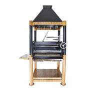 Tagwood BBQ The Beast Argentine Santa Maria grill with wood and charcoal fuel, black steel, bamboo frame, adjustable grates, and side shelf.