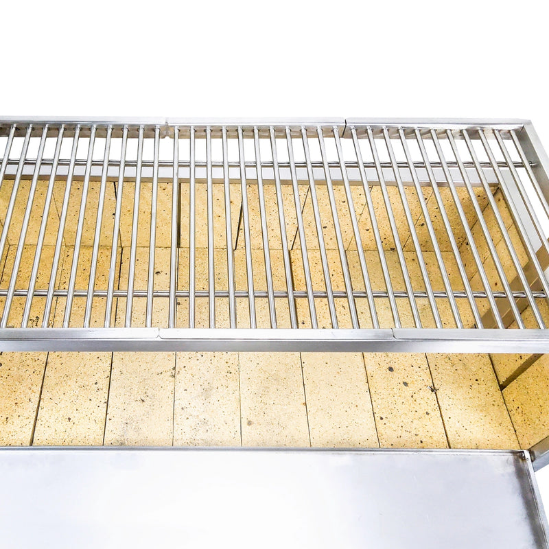 Tagwood BBQ Freestanding Argentine Santa Maria Grill with stainless steel adjustable grates and ceramic firebox for wood and charcoal cooking.