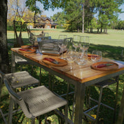 Tagwood BBQ Table Top Warming Brazier BBQ07SS stainless steel warming brazier with skewers on outdoor wooden table setting