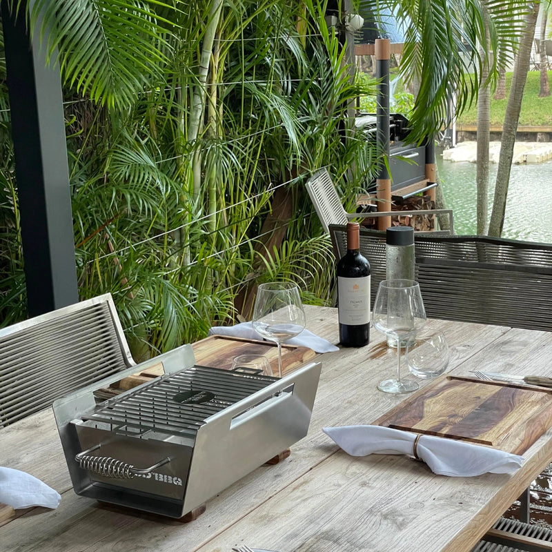 Tagwood BBQ Table Top Warming Brazier BBQ07SS in stainless steel with skewers, heavy-duty rust-resistant design, perfect for outdoor tables.