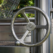 Tagwood BBQ Santa Maria Wood Fire & Charcoal Gaucho Grill all SS304 with stainless steel height-adjustable grate wheel and heavy-duty construction.