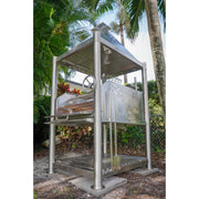 Tagwood BBQ Santa Maria Wood Fire & Charcoal Gaucho Grill BBQ12SS with stainless steel frame, adjustable grates, and brasero firebox outdoors.