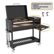 Tagwood BBQ Freestanding Argentine Wood Fire & Charcoal Gaucho Grill BBQ18SI in black steel with grilling grates, side table, and casters for mobility.