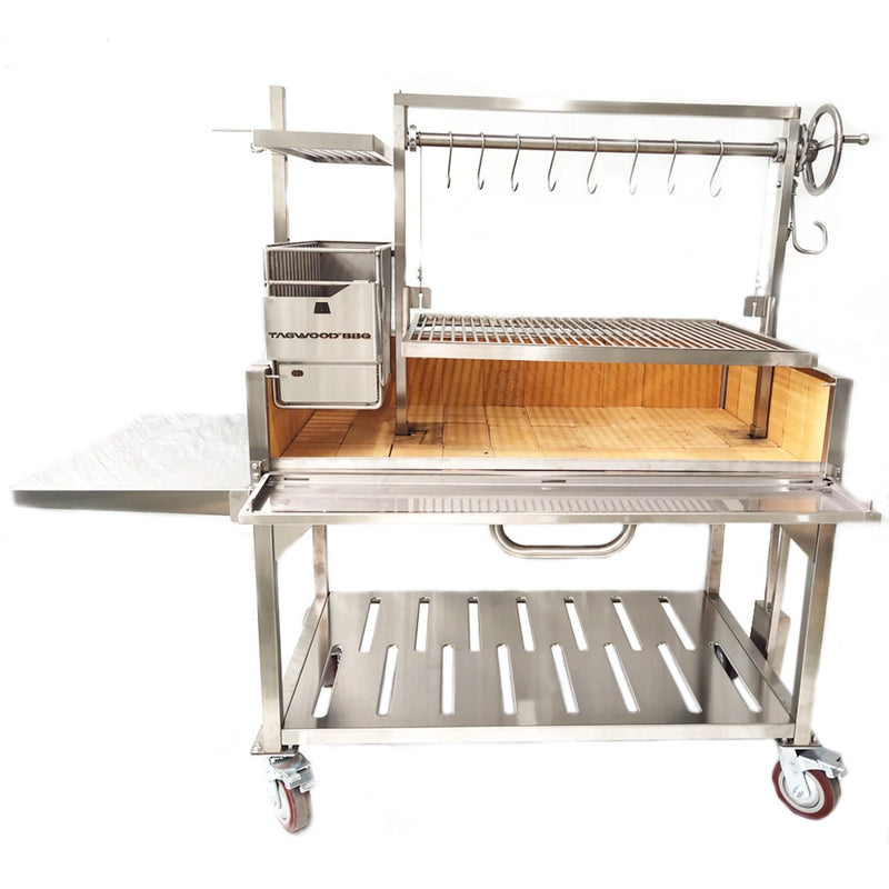 Tagwood BBQ XL Freestanding Argentine Santa Maria Grill with stainless steel, height-adjustable grates, side shelf, and rolling casters.