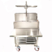 Tagwood BBQ XL Freestanding Argentine Santa Maria grill in stainless steel with adjustable grates, brasero firebox, and large prep table on wheels.