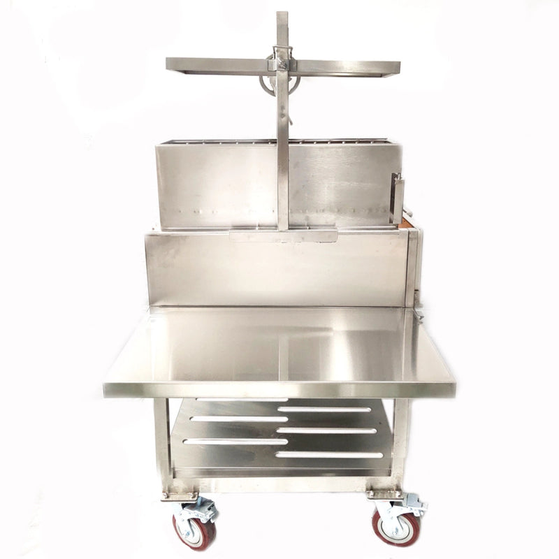 Tagwood BBQ XL Freestanding Argentine Santa Maria grill in stainless steel with adjustable grates, brasero firebox, and large prep table on wheels.